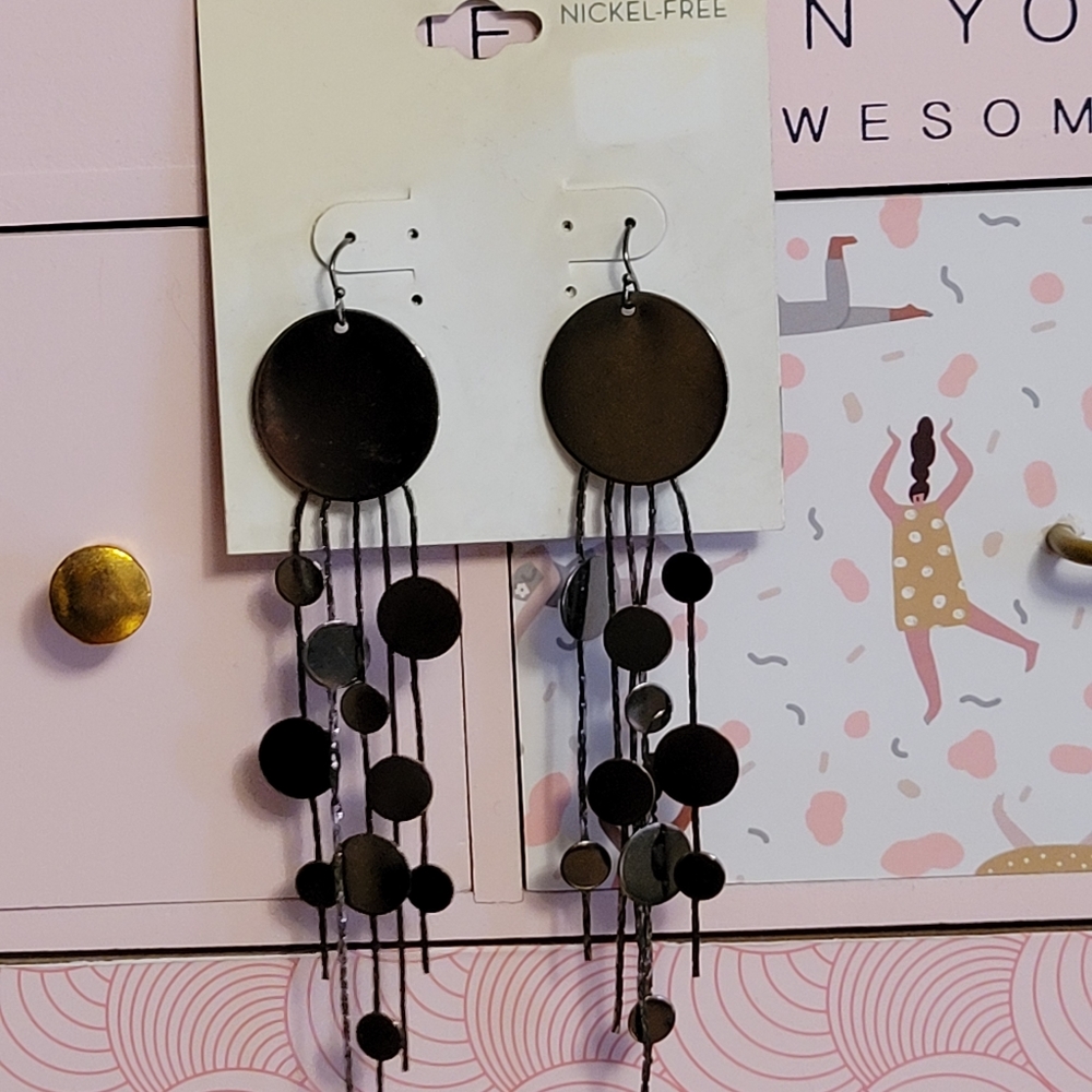 Blackish circle length earrings
